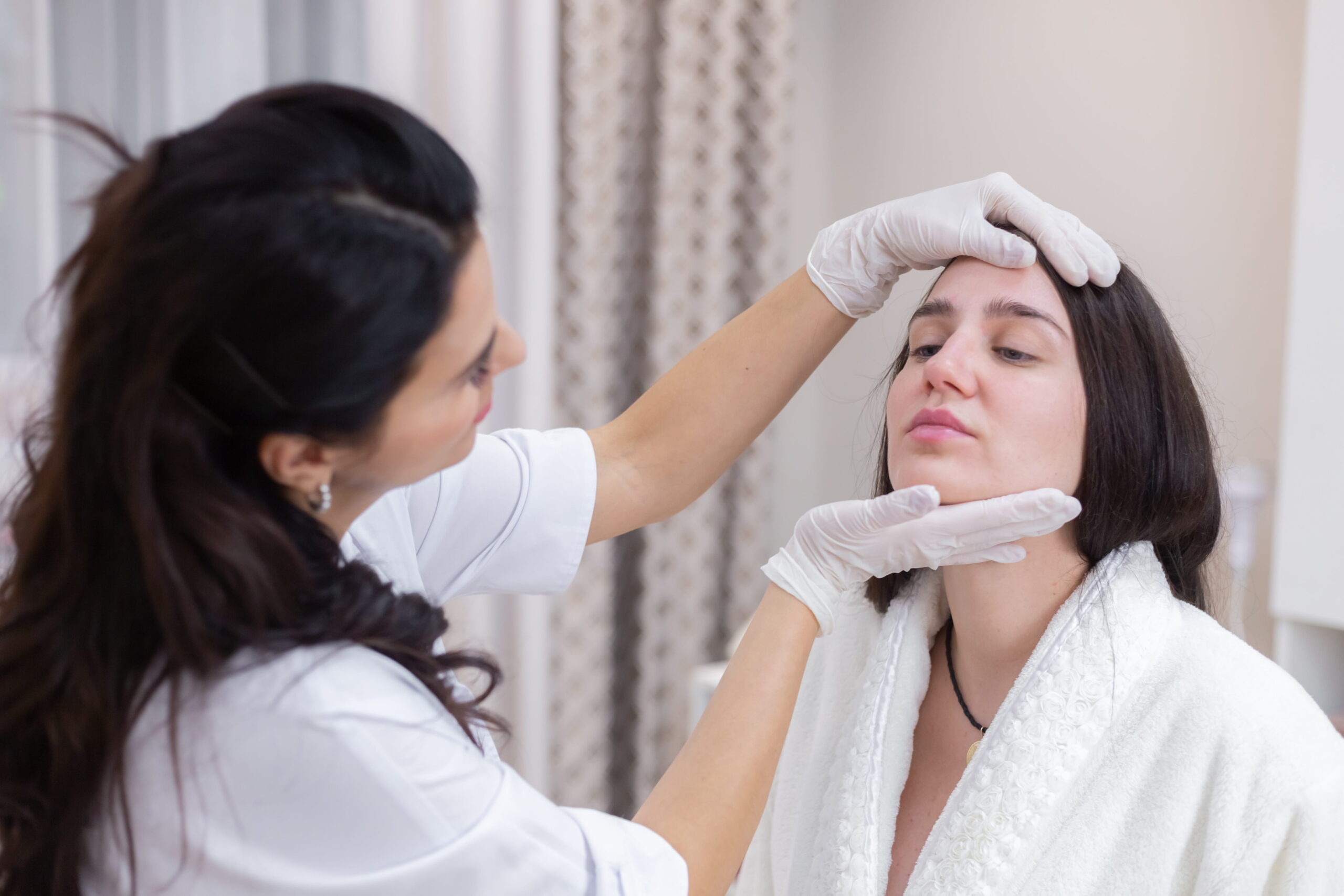 Patient receiving a non-surgical injection-based treatment at a medical clinic